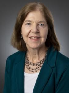 Dr Cullen, an older white woman with brown hair