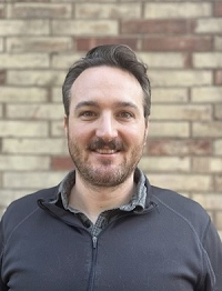 Headshot of Evan Mix.
